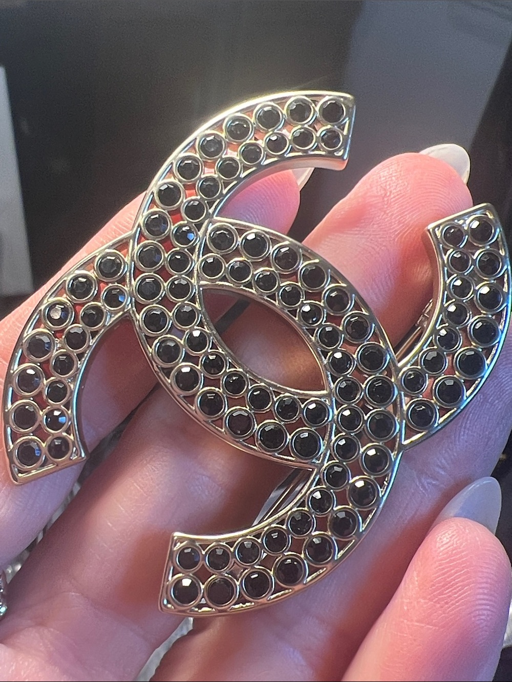 Gold-Tone Brooch with Black Stones - Luxury Interlocking Design